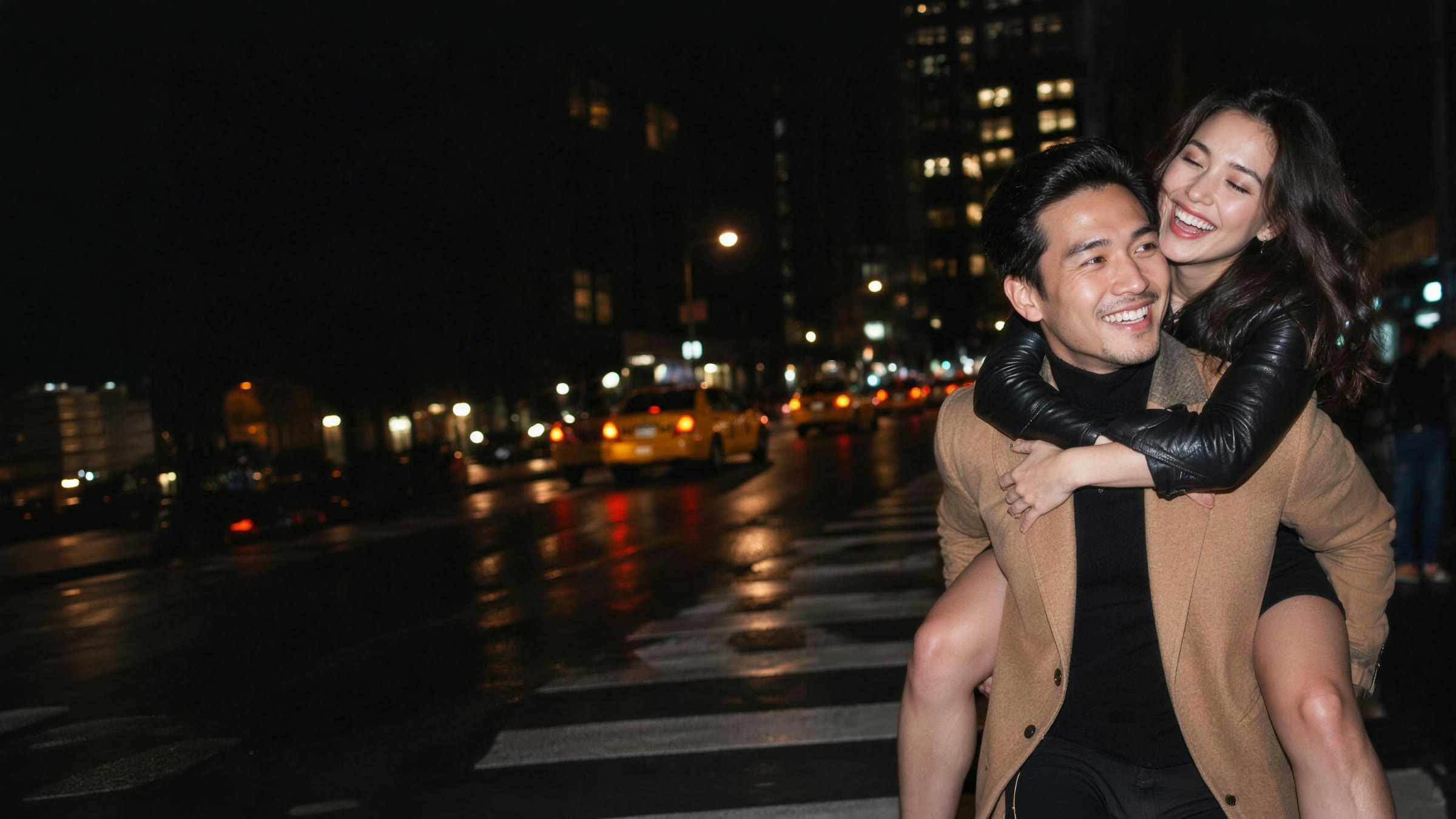 A man giving his girlfriend a piggyback across a New York street at night